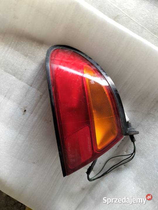 Mazda 323F BA Lampa tylna tył lewa Kamień Kolonia Sprzedajemy pl