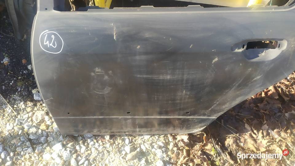 Nissan Primera P11 1997 98 2001 drzwi lewe tył Byków sprzedam