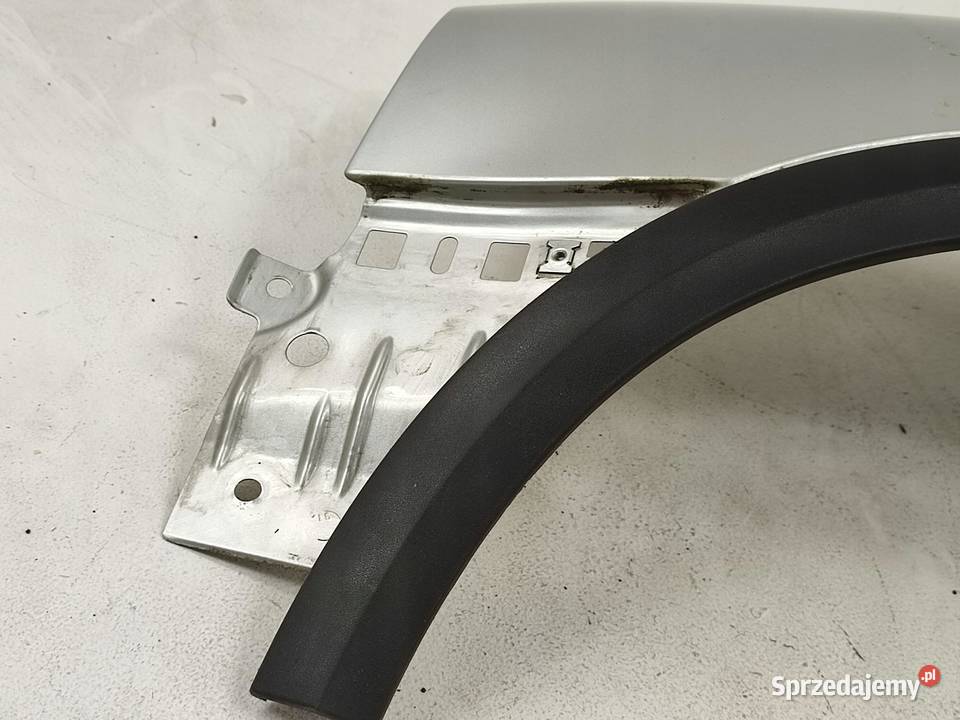 BŁOTNIK LEWY PRZÓD LISTWA VOLVO XC90 W KOLOR