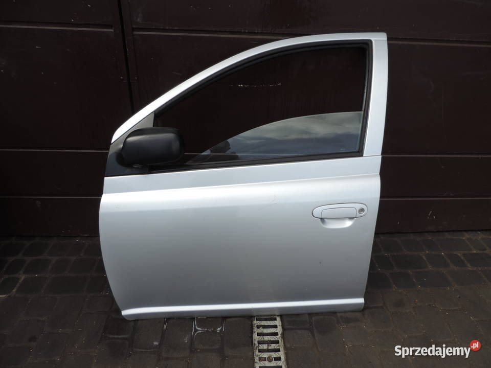 DRZWI LEWY PRZÓD TOYOTA YARIS I HB FL 1E7 małopolskie