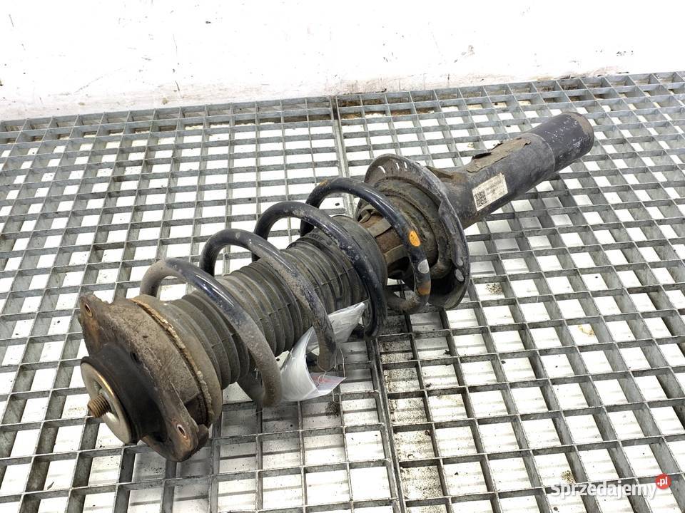 AMORTYZATOR PRAWY PRZÓD ZE SPRĘŻYNĄ VW PASSAT B7