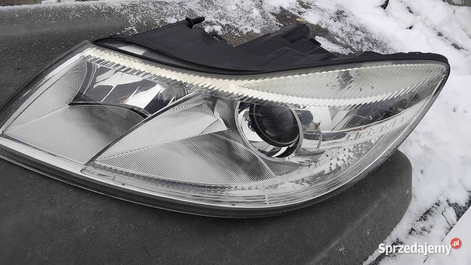Skoda Octavia II LIFT reflektor ORG EU Mielec