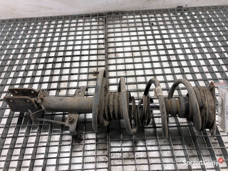 AMORTYZATOR LEWY PRZÓD ZE SPRĘŻYNĄ RENAULT CLIO