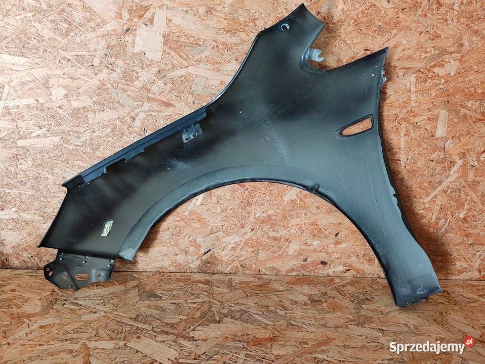 Błotnik Prawy Przód Opel Astra J osobowe Pleszew