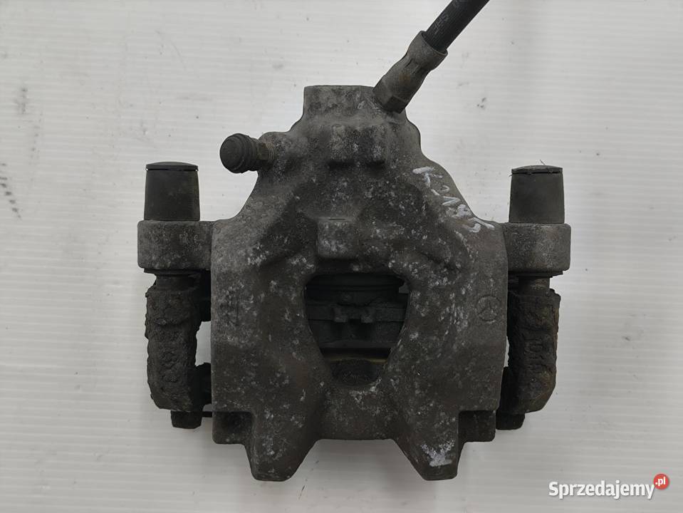 ZACISK LEWY TYŁ MERCEDES C W204 LIFT 18