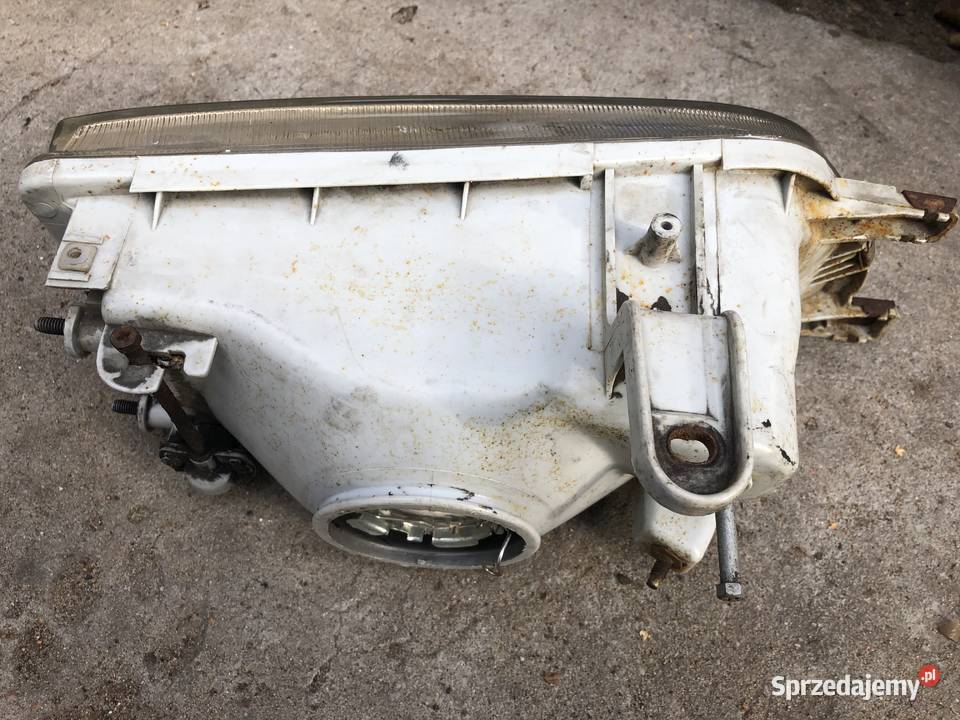 Toyota Corolla VI E9 reflektor lampa przód lewa Oświetlenie Otwock