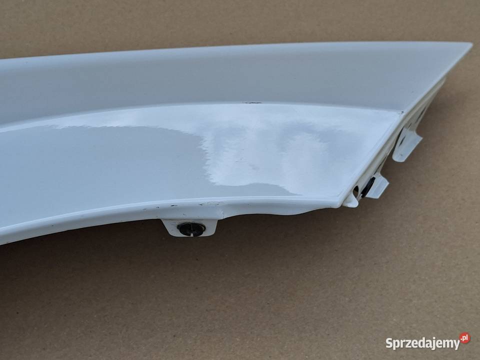 SKODA ENYAQ 5LA BŁOTNIK PRAWY PRZÓD PRZEDNI Bieleń