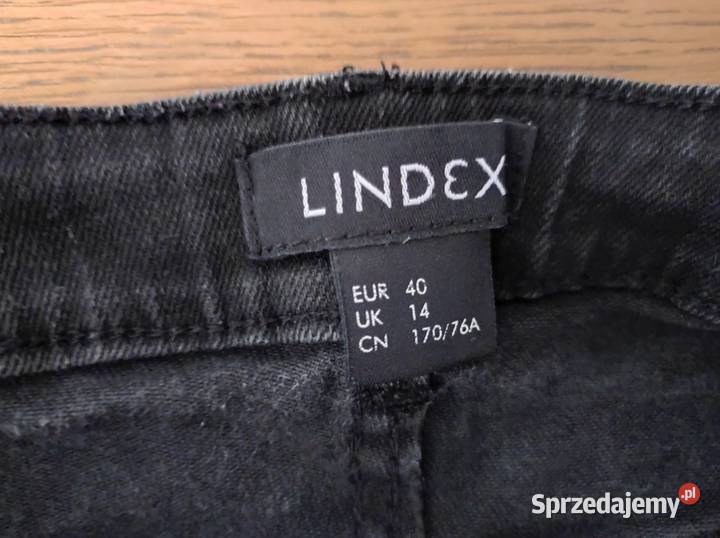 spodnie dżinsy szarpane dzwony szerokie nogawki