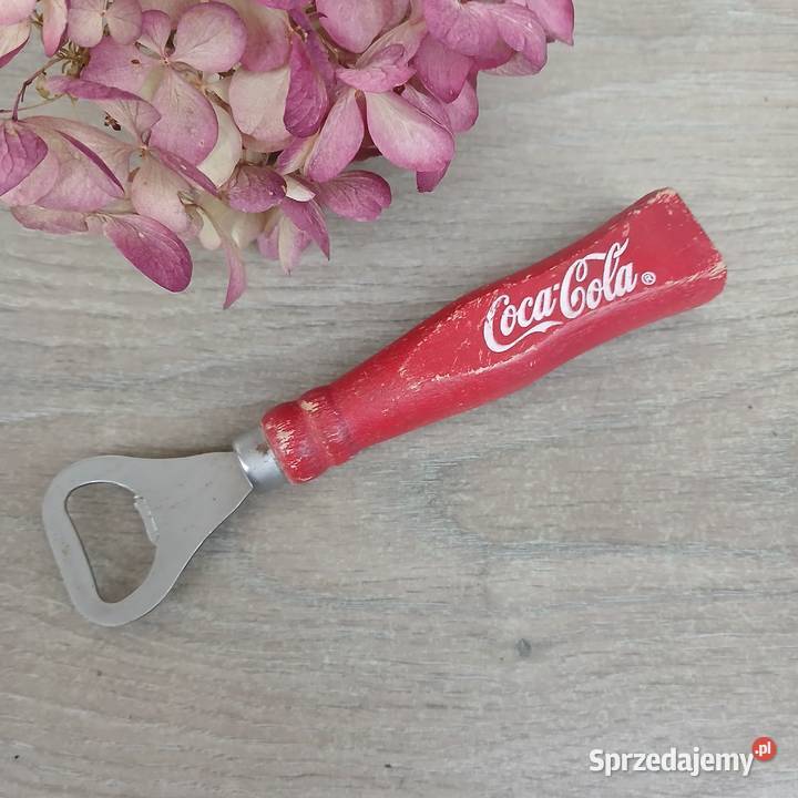 Stary drewniany otwieracz do butelek CocaCola