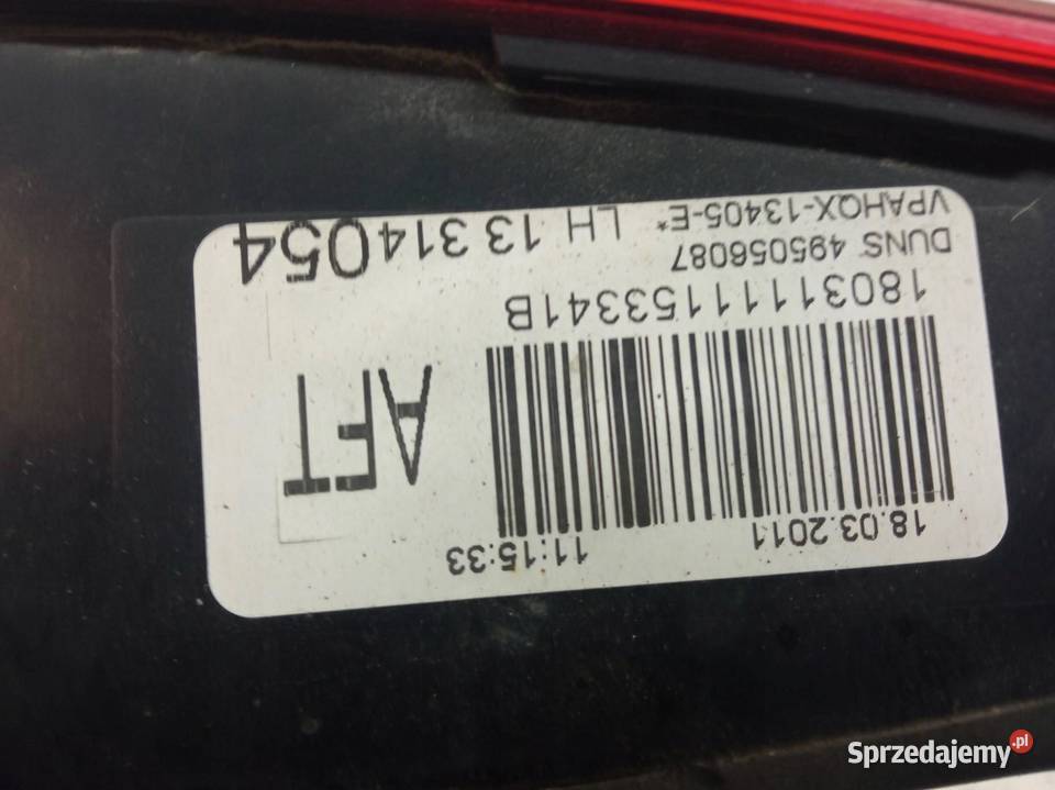 LAMPA TYŁ W KLAPĘ LEWA KOMBI 13314054 Opel Astra osobowe