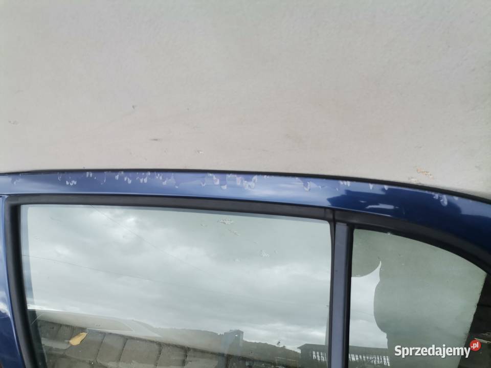 DRZWI LEWY TYŁ TOYOTA YARIS 1 8K8