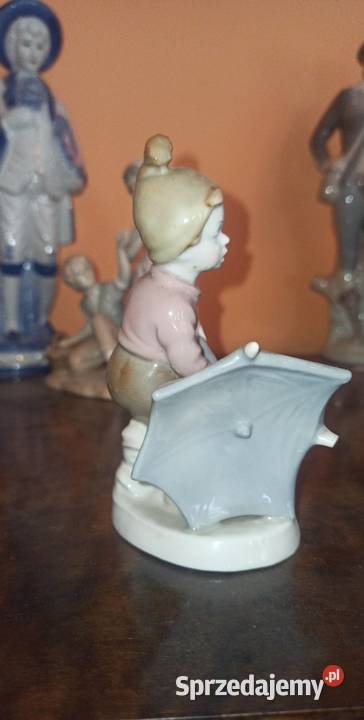 Figurka chłopca z parasolem Syg Import i 646 sprzedam