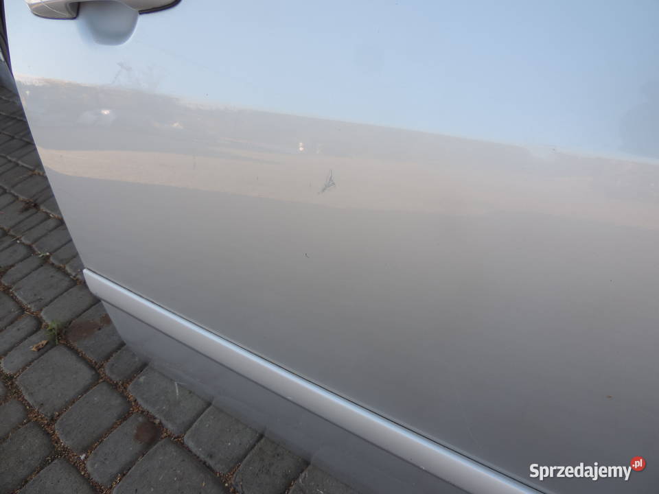 DRZWI LEWE PRAWY PRZÓD PRZEDNIE SUZUKI LIANA HB części blacharskie Nowy Sącz sprzedam