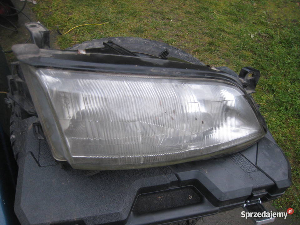 Lampa przednia prawa reflektor ori carello Opel Kraków