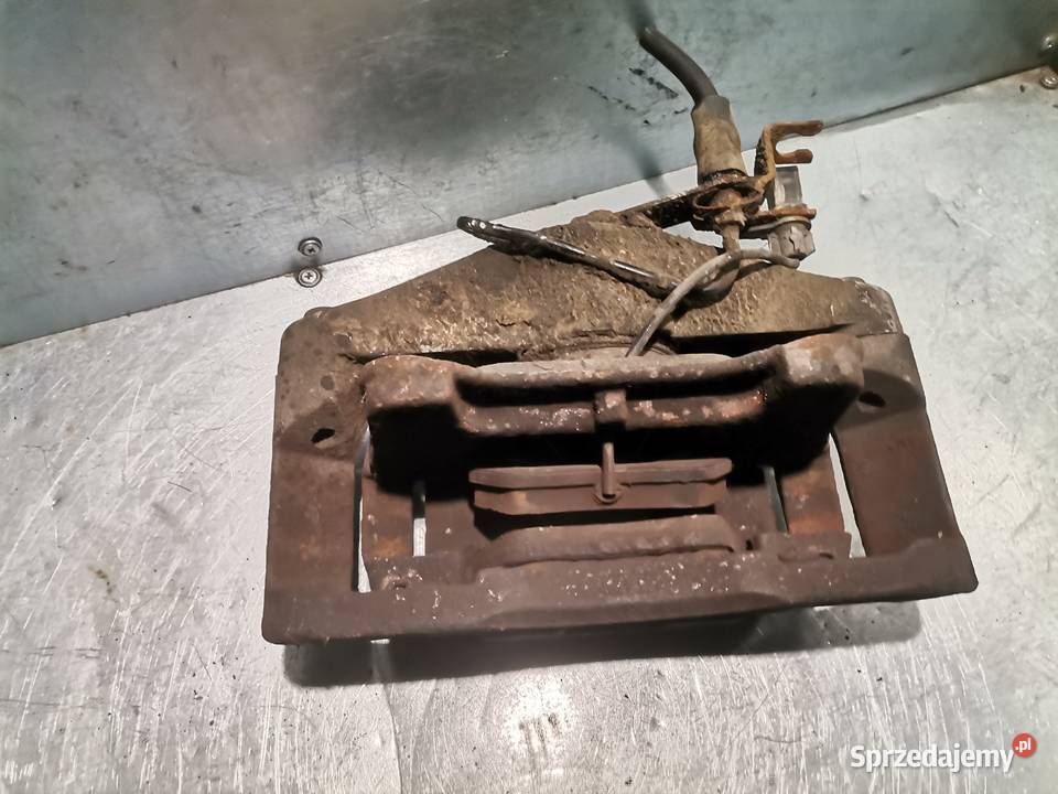 ZACISK 973 LEWY PRZÓD AUDI A4 B6 A6 C5 LIFT POD osobowe