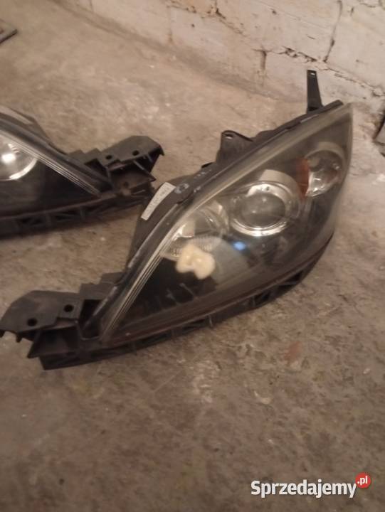 Reflektory mazda 3 stan