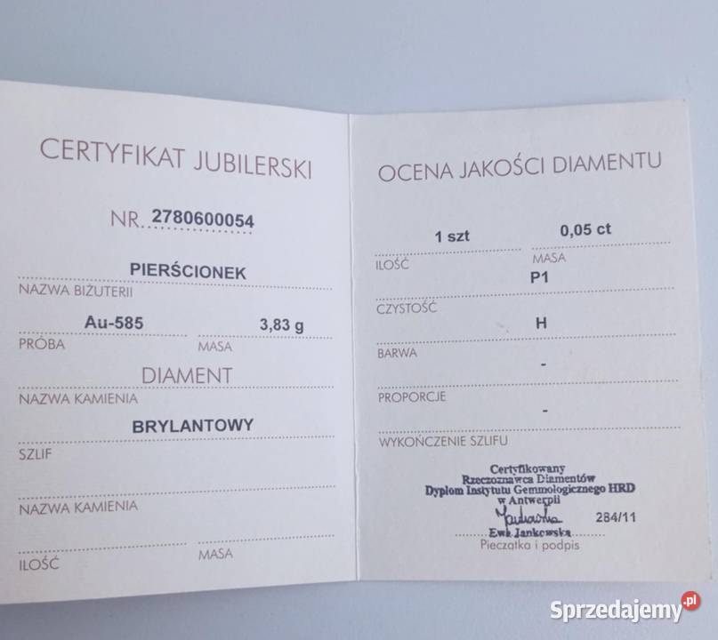 sprzedam piękny złoty pierścionek z brylantem sprzedam
