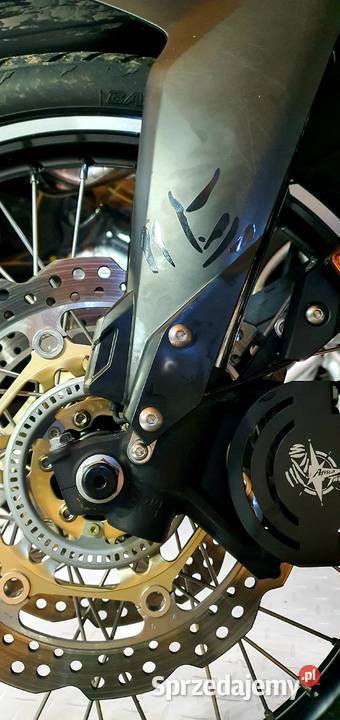 Raising the front wheel fender Mielec