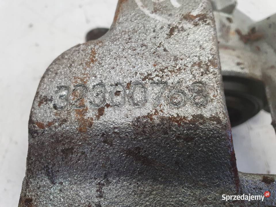 Polestar II PRZEDNI ZACISK HAMULCOWY lewy przód Rudka