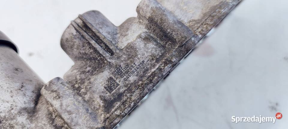 NASADA GŁOWICY WAŁKI AUDI VW SKODA 04E103475P Przystajń