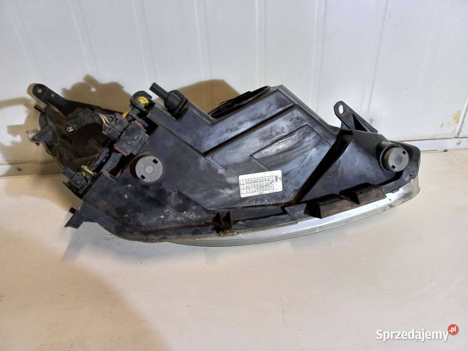 LAMPA LEWA PRZEDNIA OPEL CORSA D 13186381 Lampy przednie Chełm