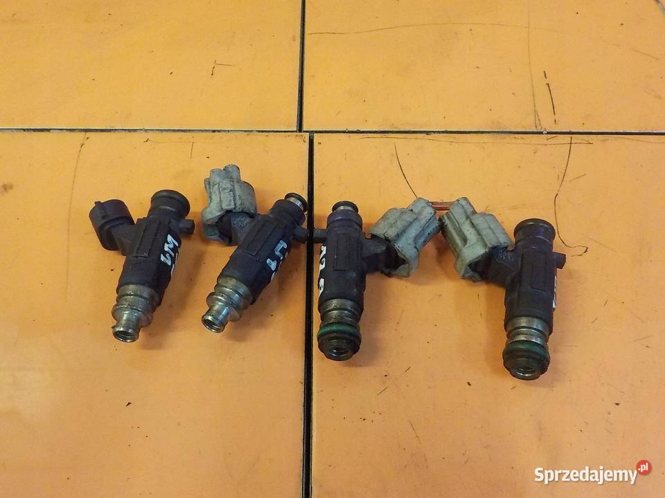 NISSAN XTRAIL PRIMERA 20 B 04r 140 QR20DE wtrysk Wtryskiwacze Suków
