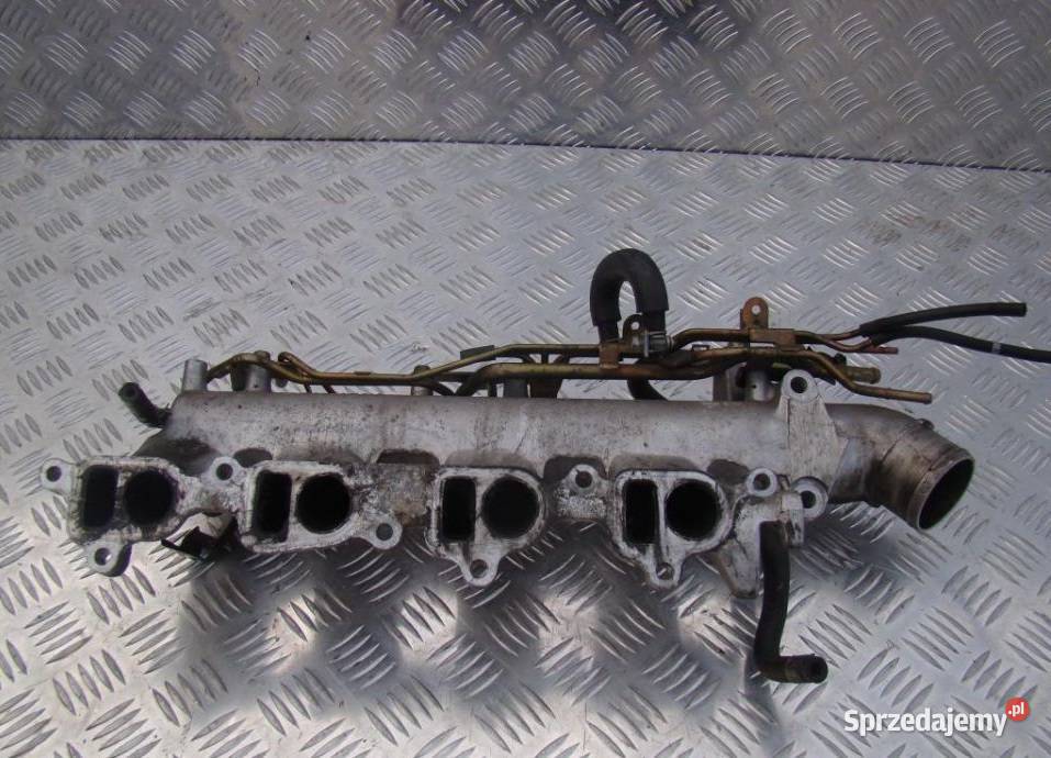 NISSAN PRIMERA P12 KOLEKTOR SSĄCY osobowe Nowy Tomyśl