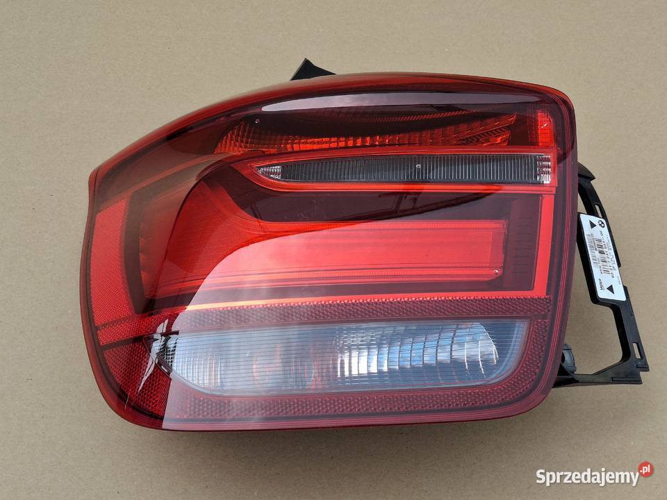 BMW 1 FZ0 FZ1 LAMPA LEWY TYŁ LEWA TYLNA ORYGINAŁ