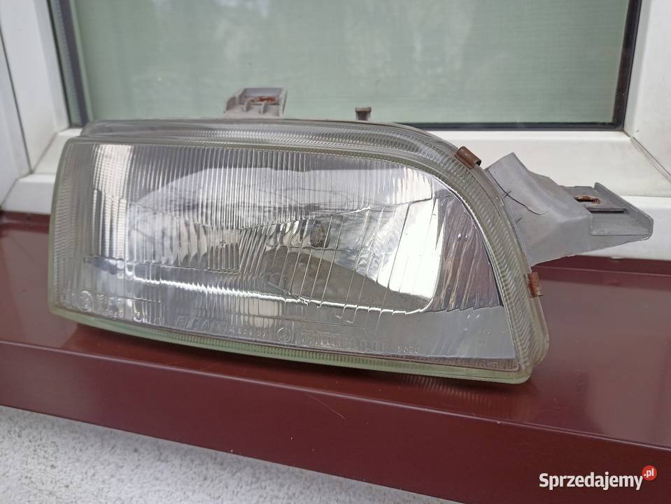Fiat Punto 1 I lampa przednia prawa reflektor Motoryzacja