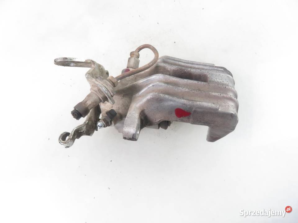 ZACISK PRAWY TYŁ VW GOLF V 1K1 14 16V BCA