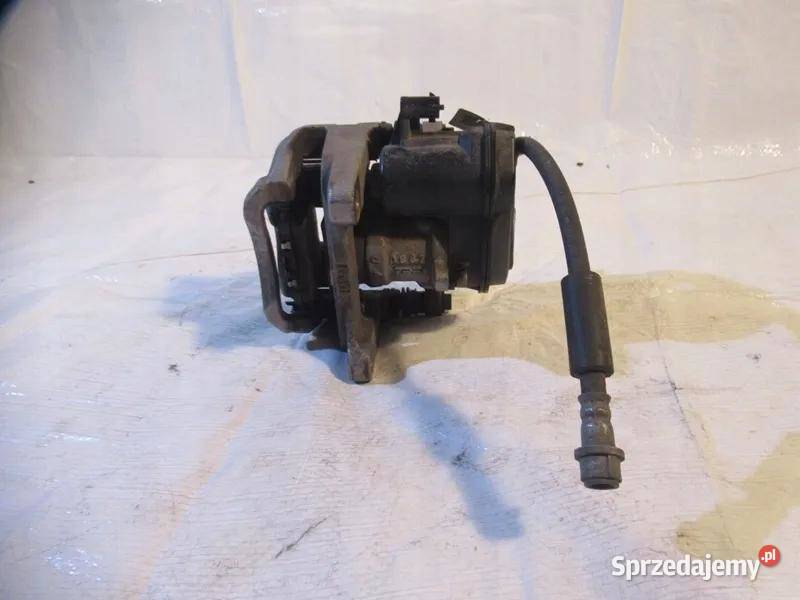 OPEL INSIGNIA B ZACISK LEWY TYŁ 84323162