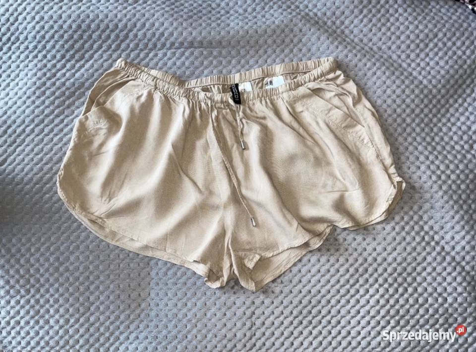 Beżowe cieliste szorty spodenki beige HM divided Ząbki