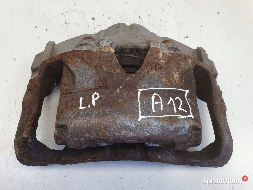 Volvo S60 II V60 I PRZEDNI ZACISK HAMULCOWY lewy Rudka