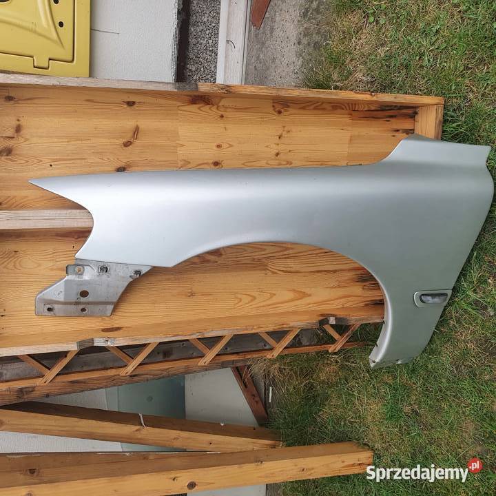 Błotnik lewy 42626 Volvo s60 v70 II 00 srebrny Kraków