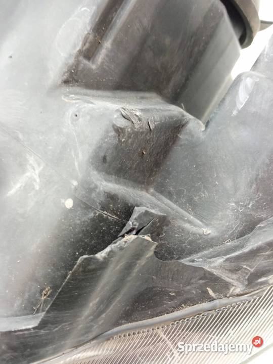 LAMPA PRZÓD PRAWA SOCZEWKA H7 EU USZKODZONA Saab