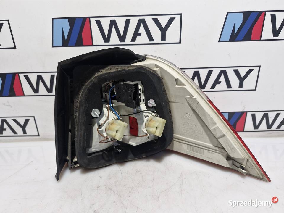 7177693 BMW E61 LAMPA LEWY TYŁ LEWA W BŁOTNIK