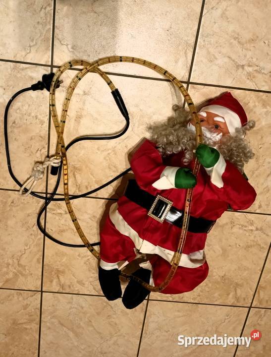 Mikołaj wspinający się linie z wężem led