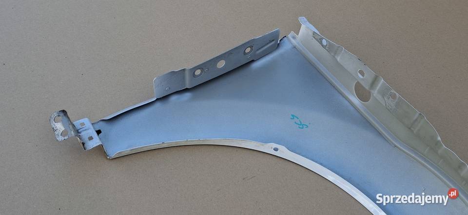 AUDI TT 8J BŁOTNIK LEWY PRZÓD PRZEDNI EMBLEMAT