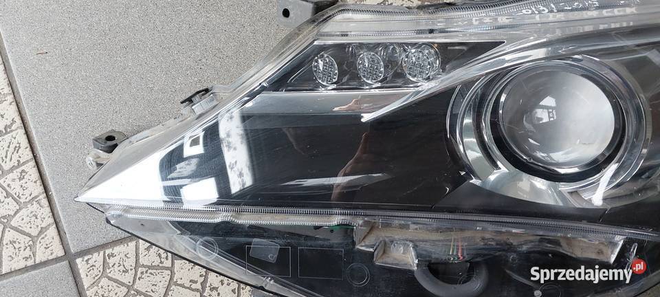 8115002e20 Toyota Auris lampa lewa 2013 2015 LED Byków