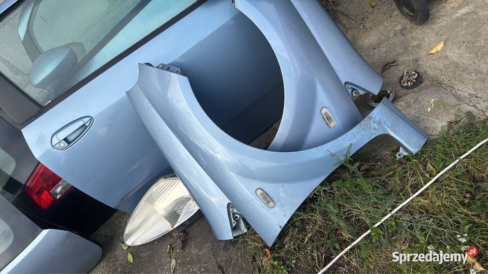 Błotnik przód prawy Fiat Grande Punto niebieski Błotniki wielkopolskie Budzyń