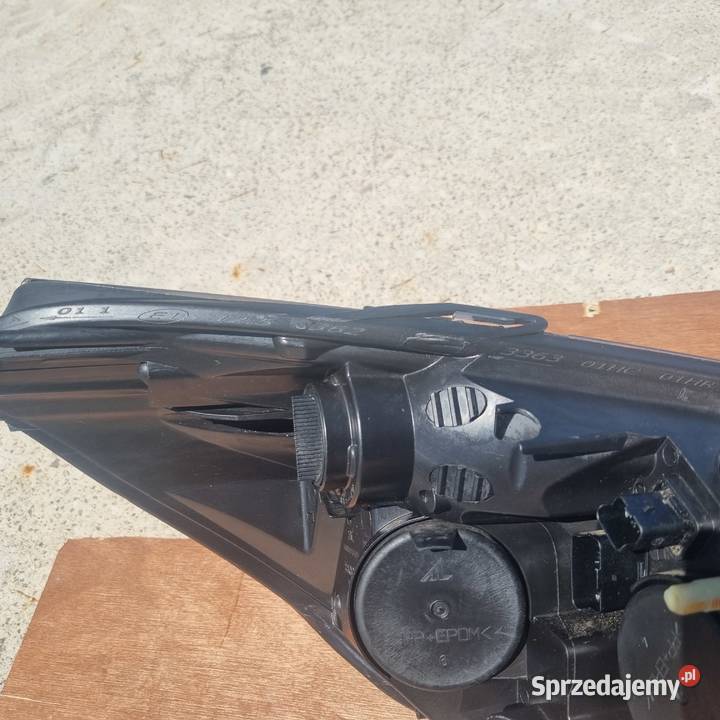 Lampa przednia lewa oryginalna OE Renault Clio Rawa Mazowiecka