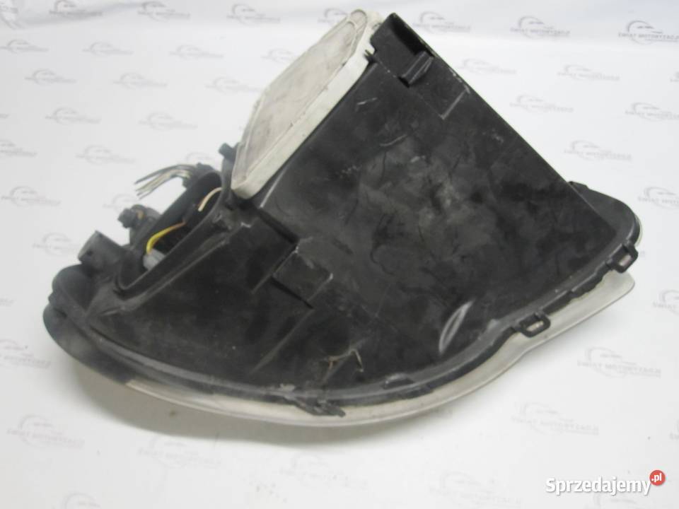 GRAND VOYAGER IV 06r lampa lewa przód 04857833AC osobowe