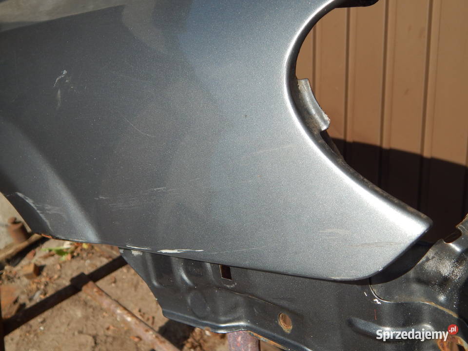 NISSAN ALMERA N16 BŁOTNIK PRAWY PRZEDNI PRZÓD osobowe Warszawa