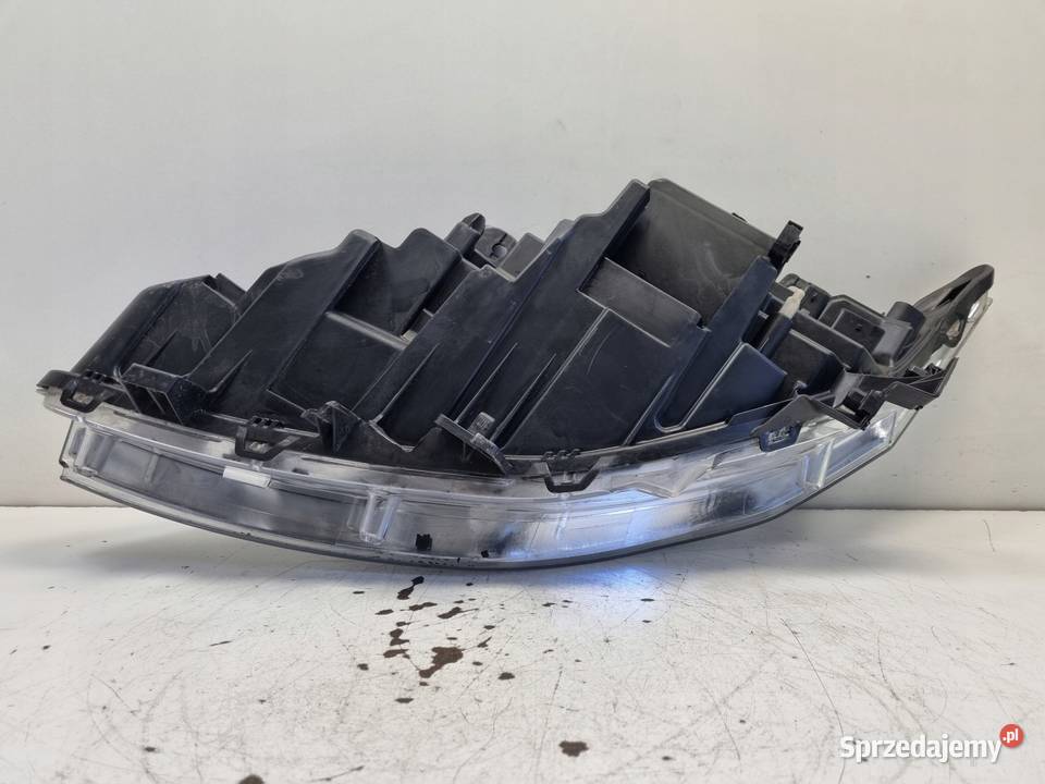 Renault Laguna III 0710r PRZEDNIA LAMPA PRAWA osobowe Lampy przednie Janów