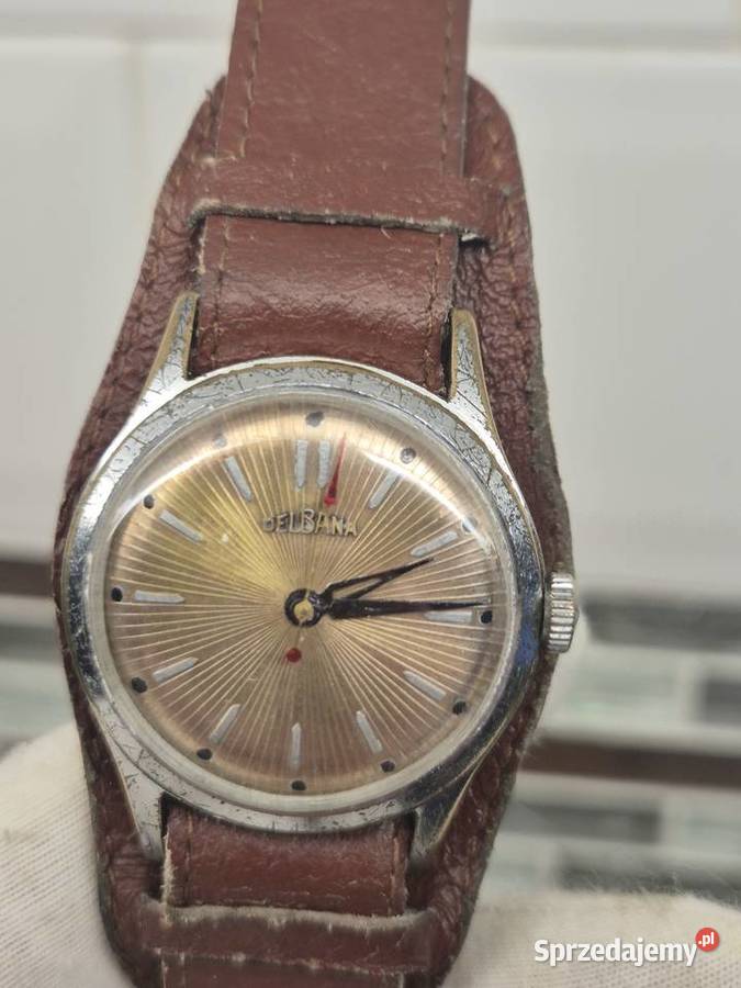 Mechaniczny zegarekDelbana z giloszowaną tarczą śląskie