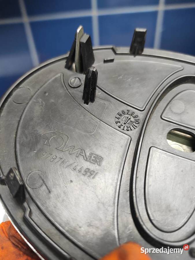 COROLLA VERSO II ZNACZEK EMBLEMAT ZDERZAKA PRZÓD Olsztyn