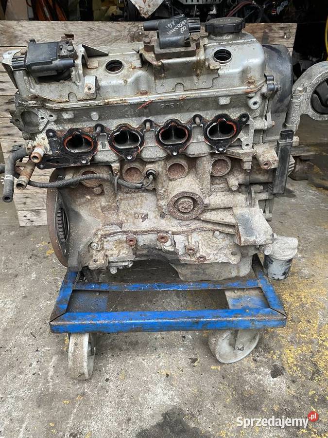 SILNIK SŁUPEK MITSUBISHI CARISMA COLT LANCER 16