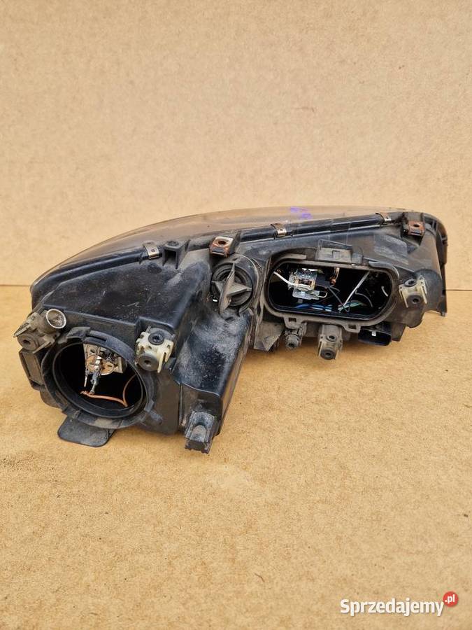 Mazda 6 lampa lewy przód przyciemniana