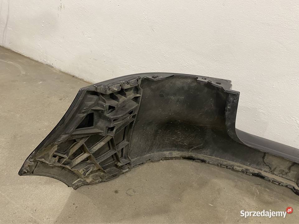 Vw golf V 5 zderzak tyl ze slizgami czarny Pełkinie