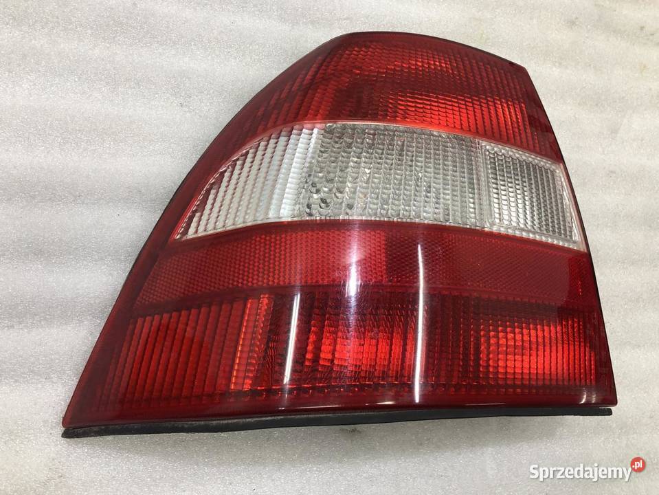 LAMPA LEWY TYŁ OPEL VECTRA B SEDAN 90568047 Lampy cofania